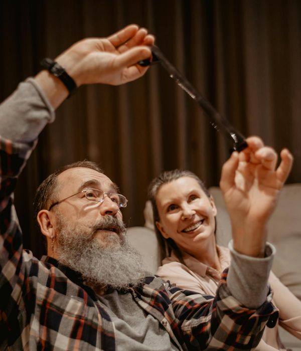 Portrait of a friendly yoga instructor smiling warmly.